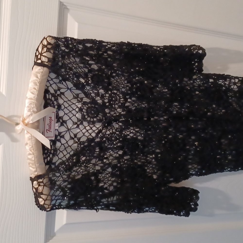 Cover in black crochet evening with sparkles